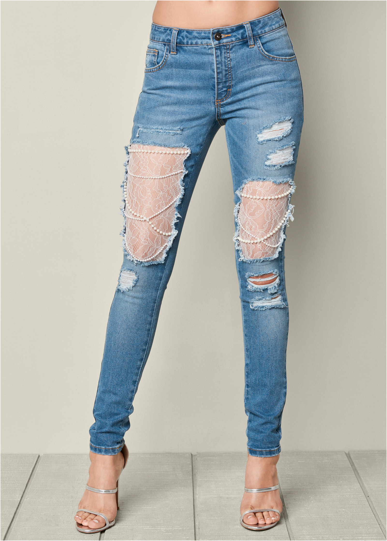 ripped jeans with pearls on them