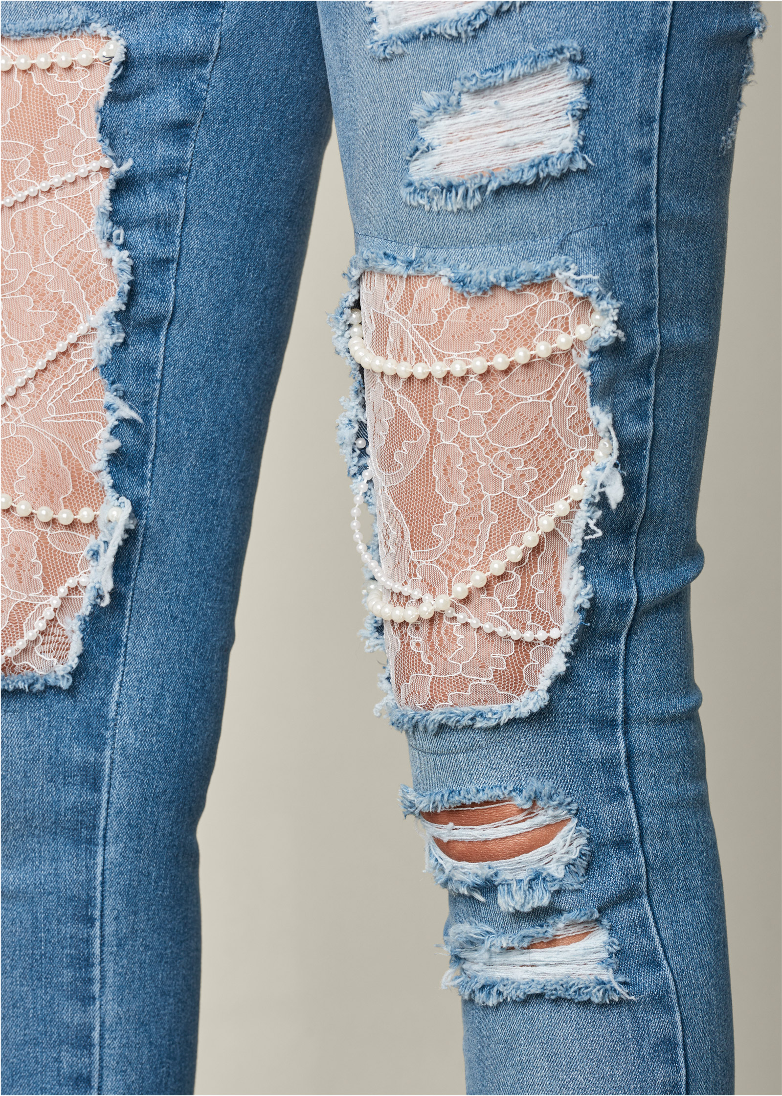 distressed jeans with pearls