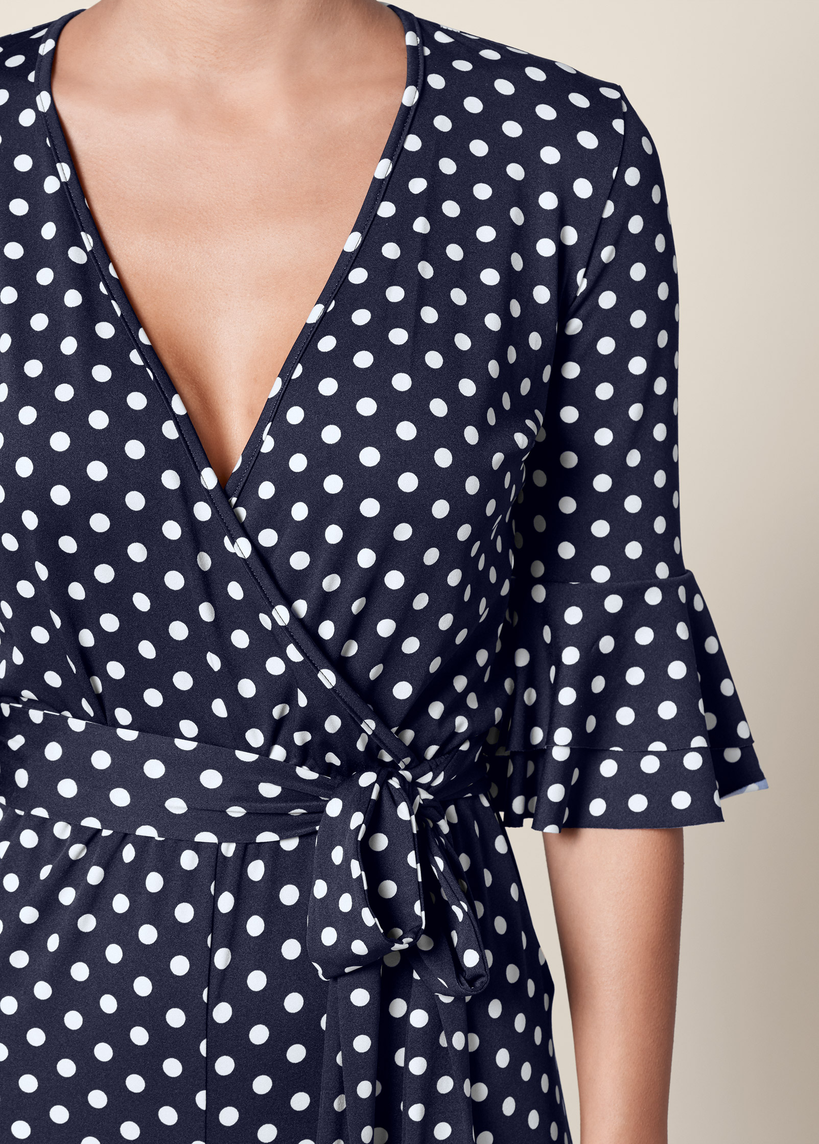 navy and white polka dot jumpsuit