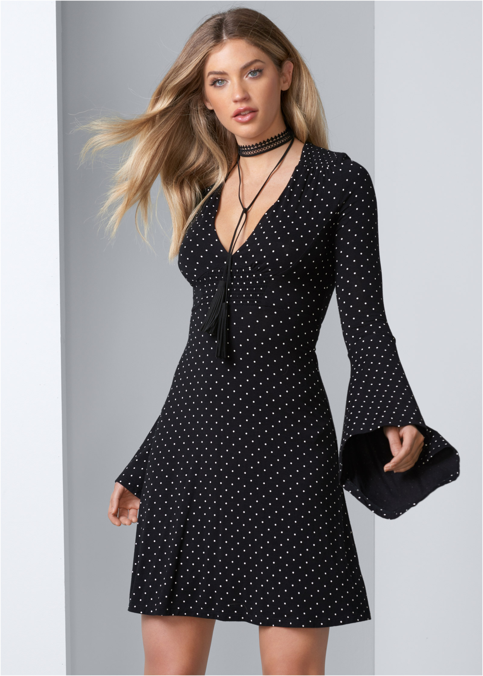 black dress with polka dot sleeves