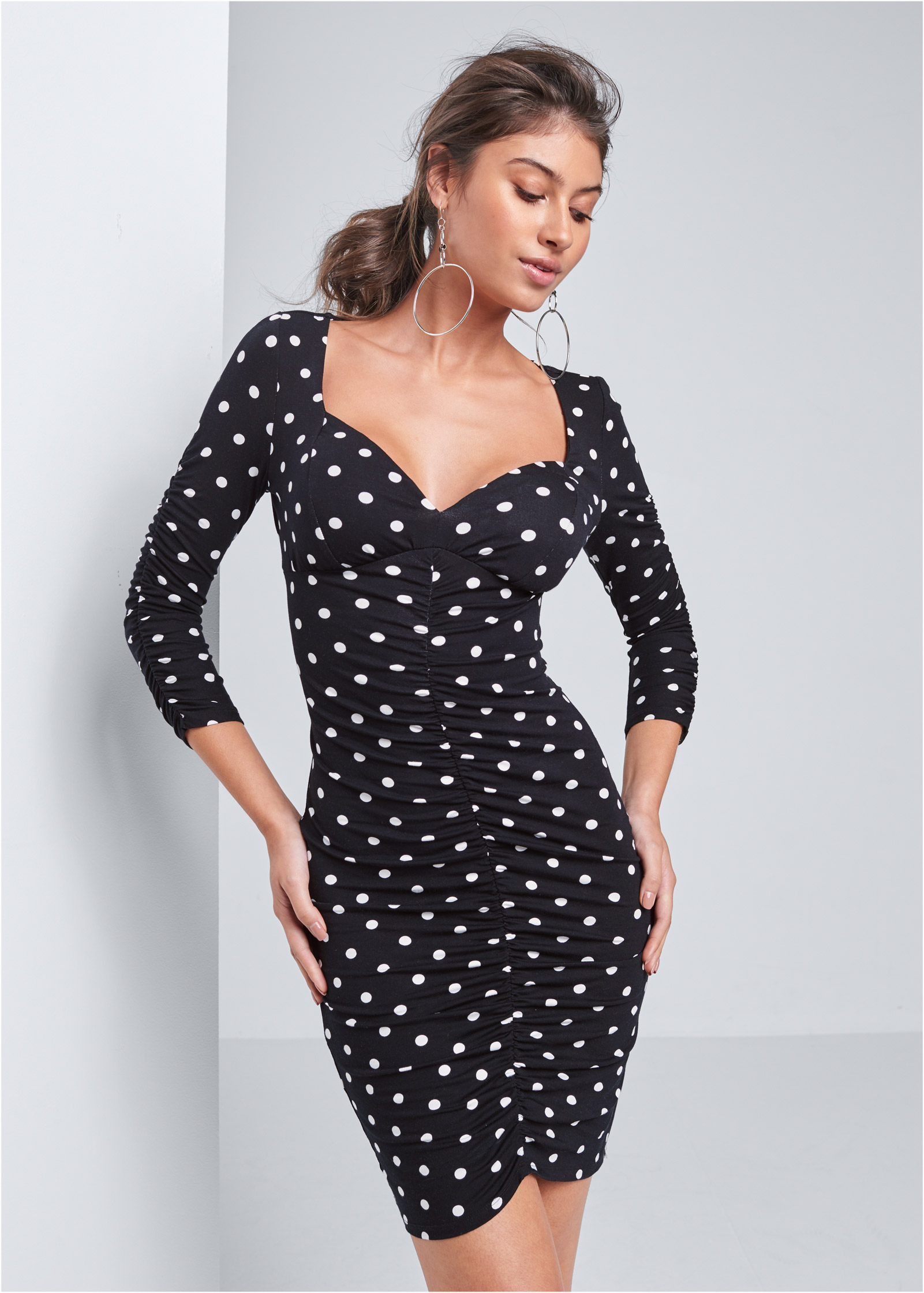 black polka dot bodycon dress