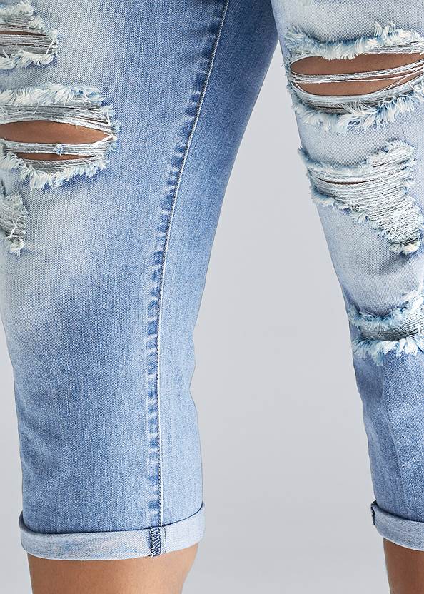 torn capri jeans