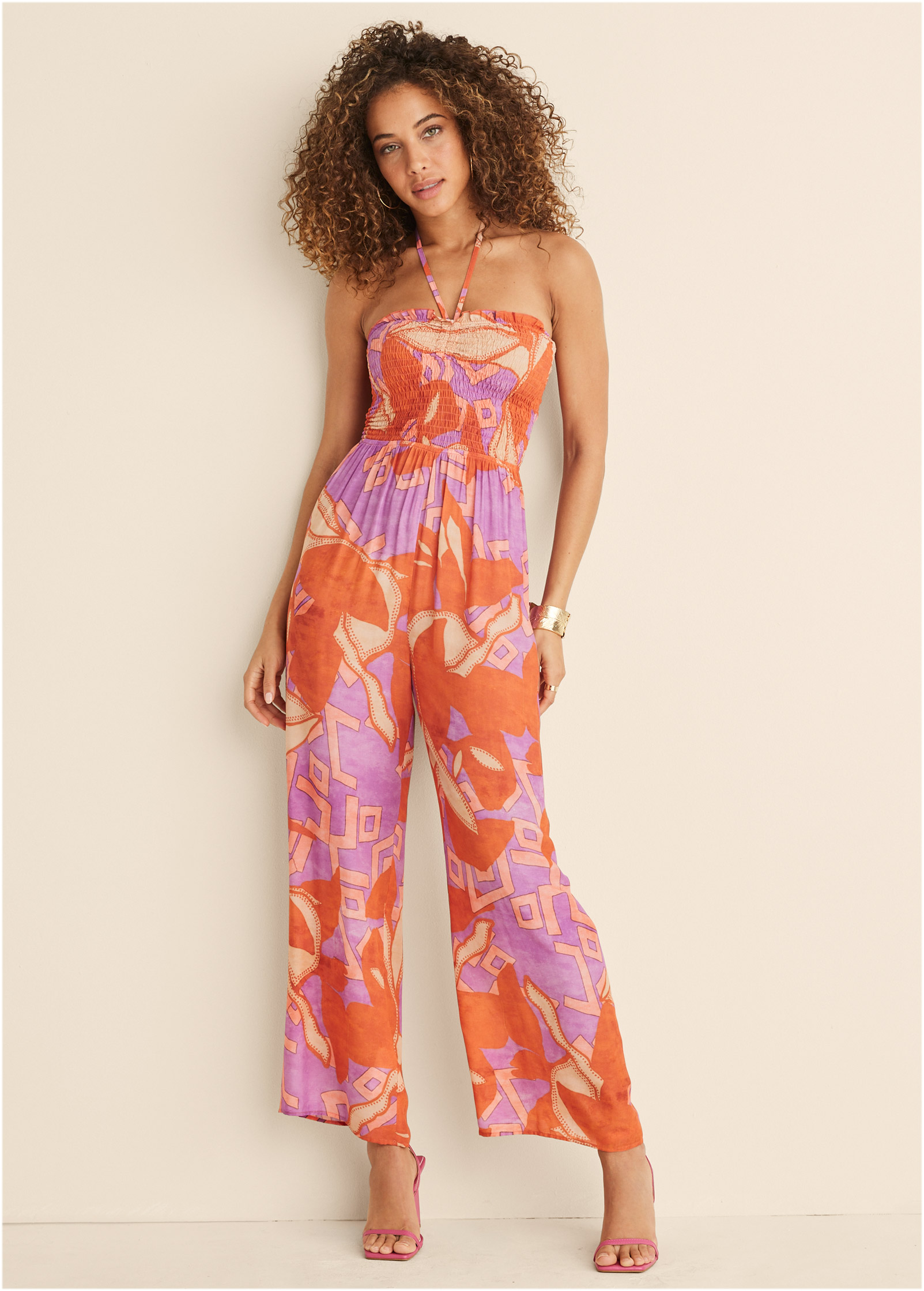 SMOCKED PRINTED JUMPSUIT in Orange Multi | VENUS